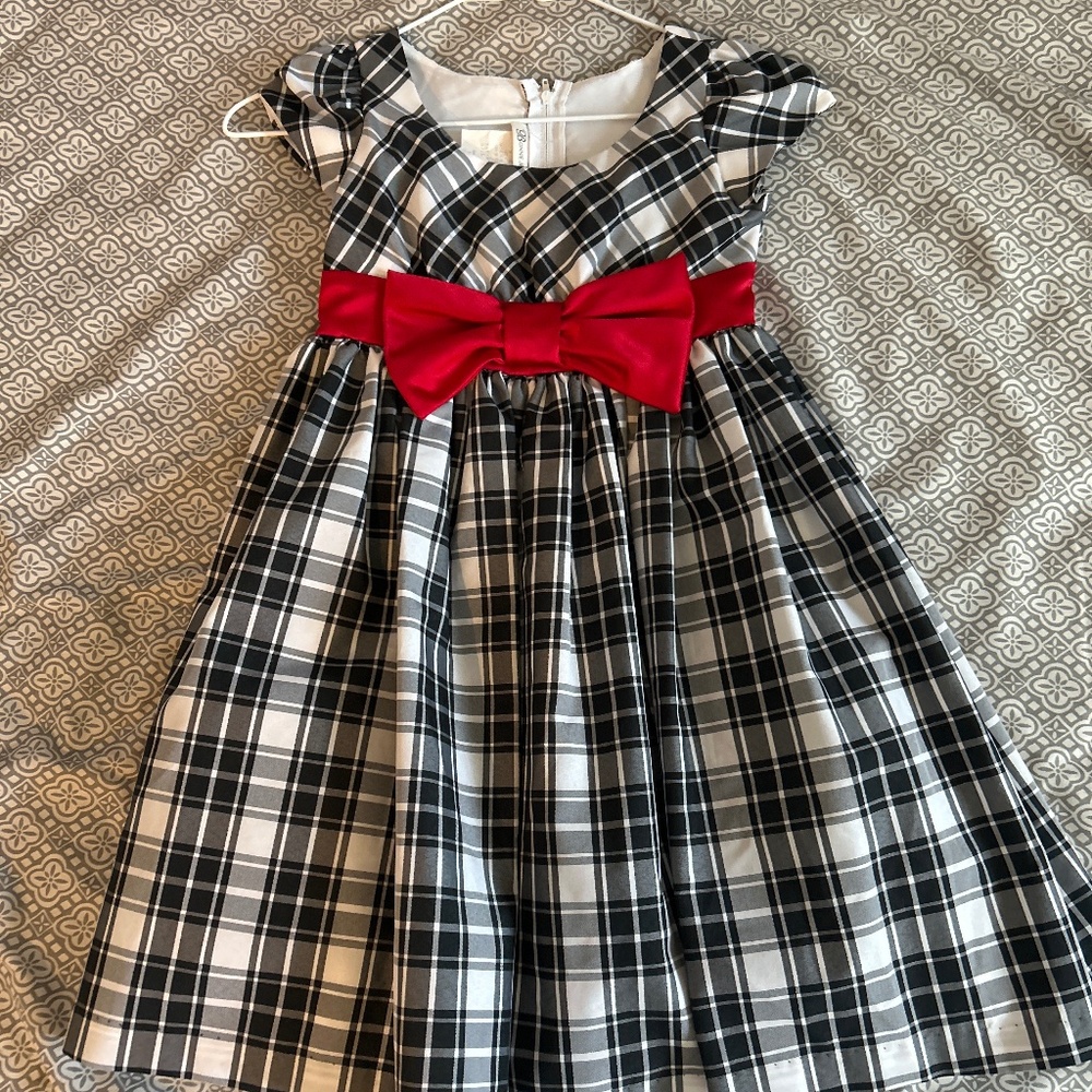A black and white plaid pattern girl's dress.